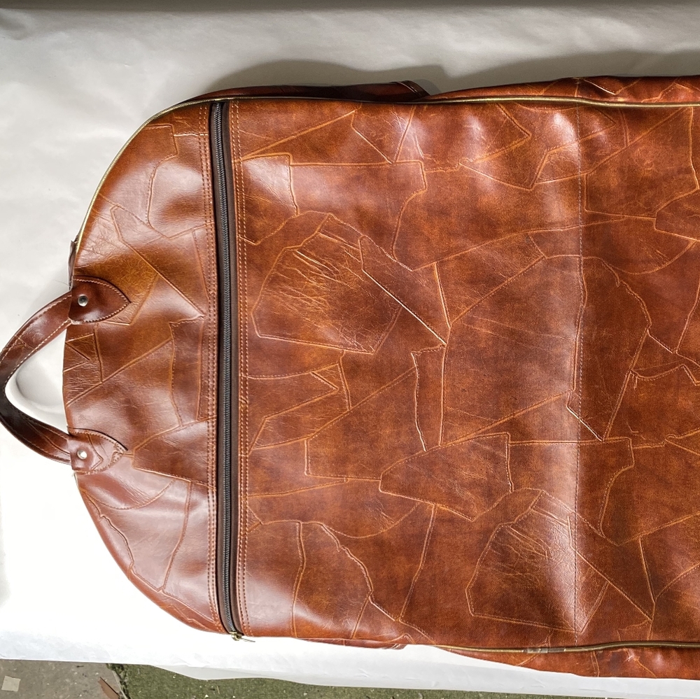 Traveling hanging leather garment bag